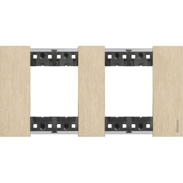 Plaque de finition Living Now Collection Les Blancs matière zamak 2x2 modules - finition Or