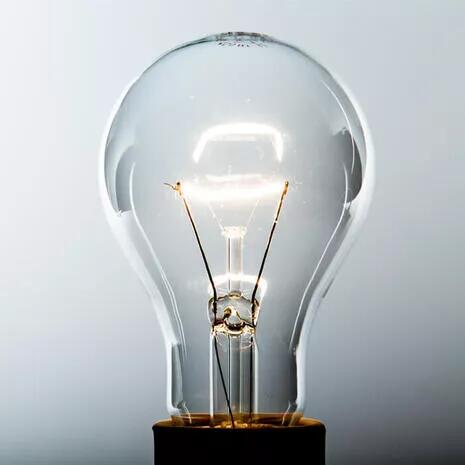 ampoule incandescent fond gris 700x700