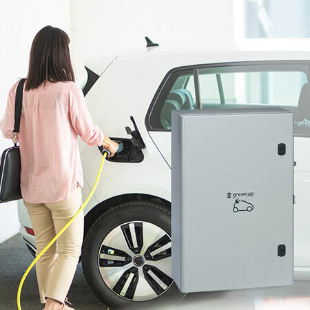 femme recharge voiture parking coffret comptage 540x540