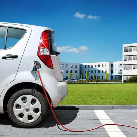 voiture electrique charge exterieur immeubles 700x700 0